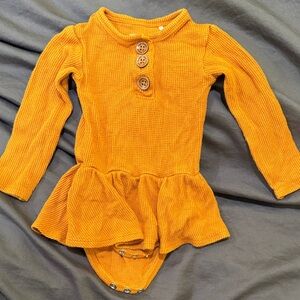 Posh Peanut Orange Long Sleeve Bodysuit